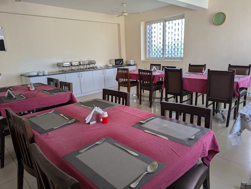 Comfortable seating in the in-house cafeteria, serving fresh meals