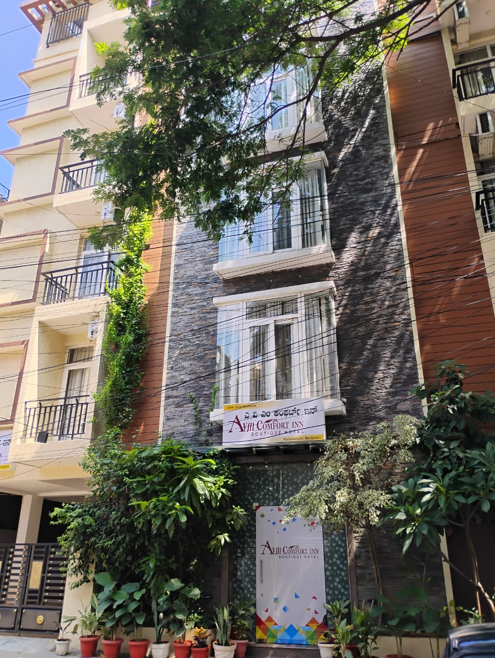 Exterior view of AVM Comfort Inn, a boutique hotel in Koramangala, Bengaluru